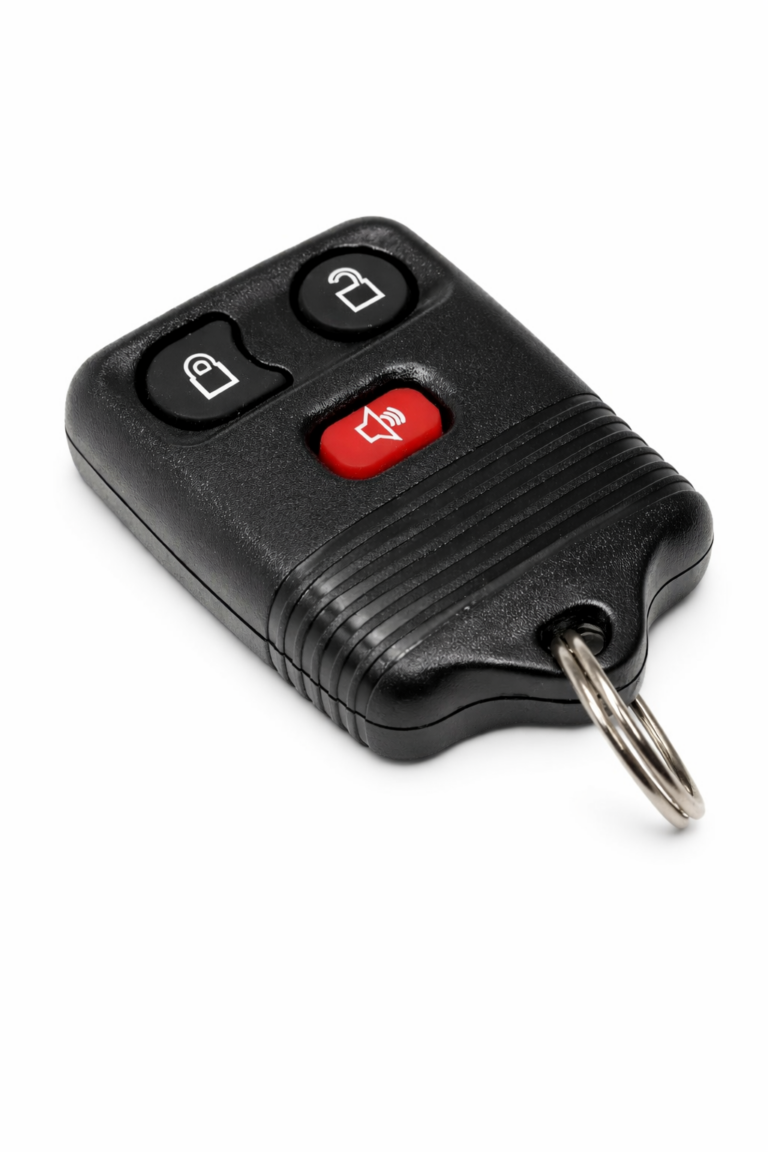 Key with built-in remote for lock/unlock. We replace and program on-site.