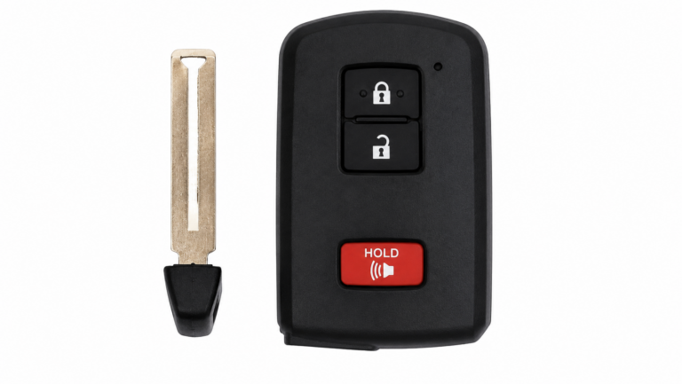 Proximity smart key fob next to its separate emergency insert blade for push-to-start vehicles